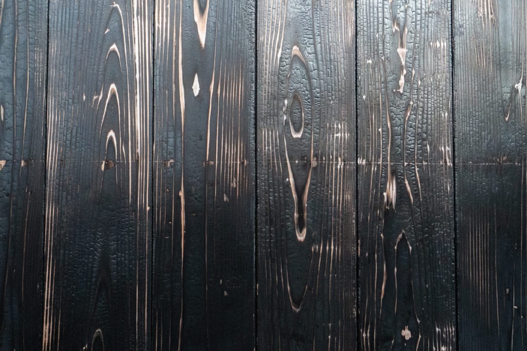 A close up photo of decades-old Nakamoto Forestry's Yakisugi "Shou Sugi Ban" in Japan