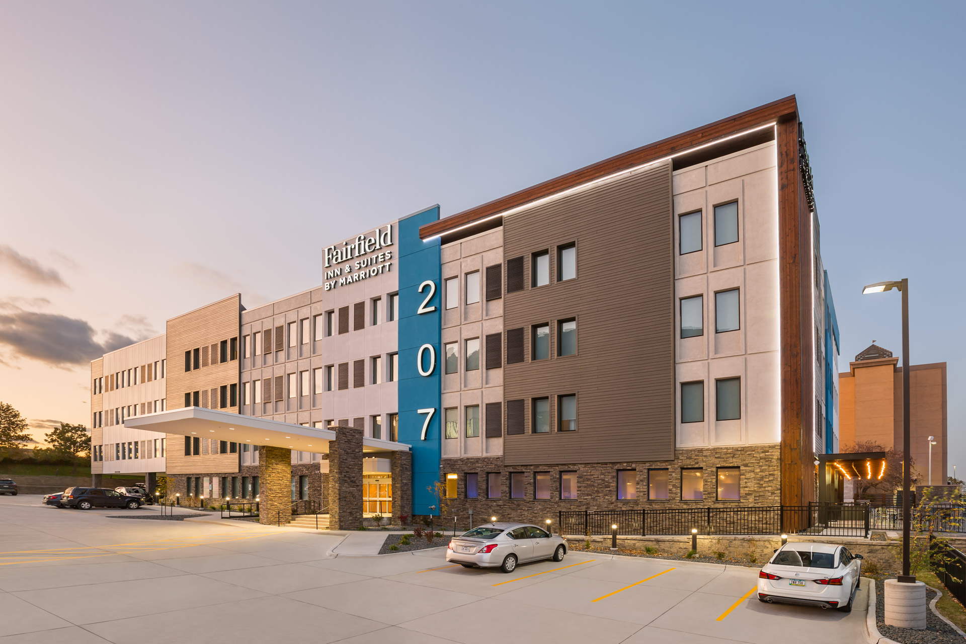 Front exterior of Fairfield Inn and Suites with Pika-Pika® Linseed Brown Yakisugi Siding