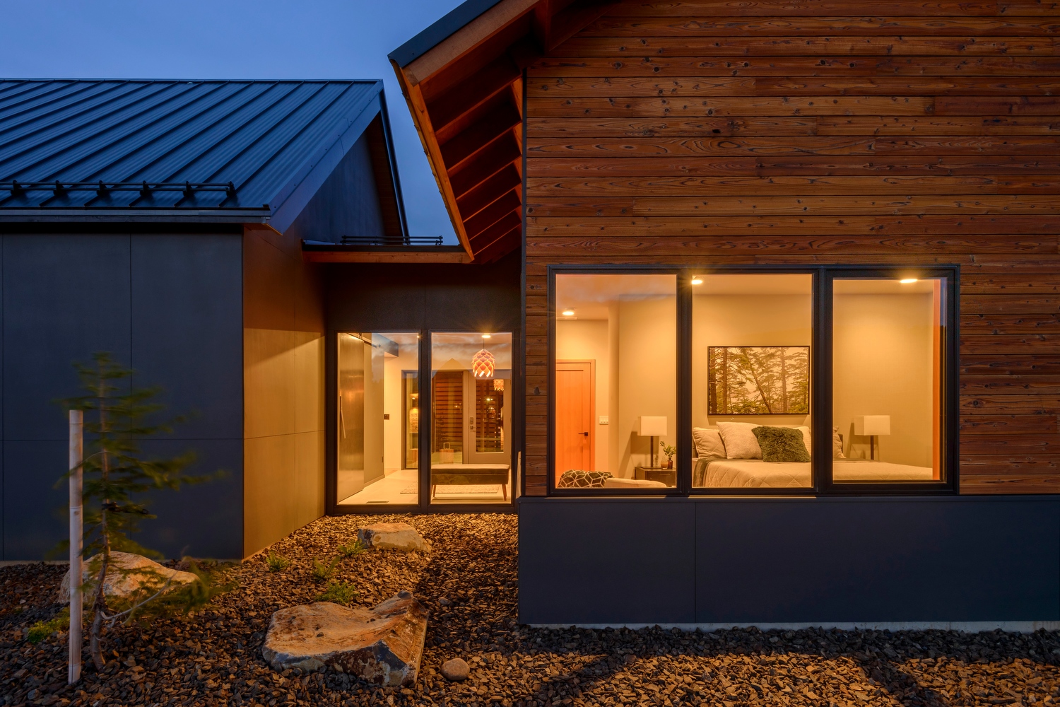 Home designed by Syndicate Smith, built by Merle Inc Custom Homes, interior design by Mandy Callaway Interiors, siding by Nakamoto Forestry.