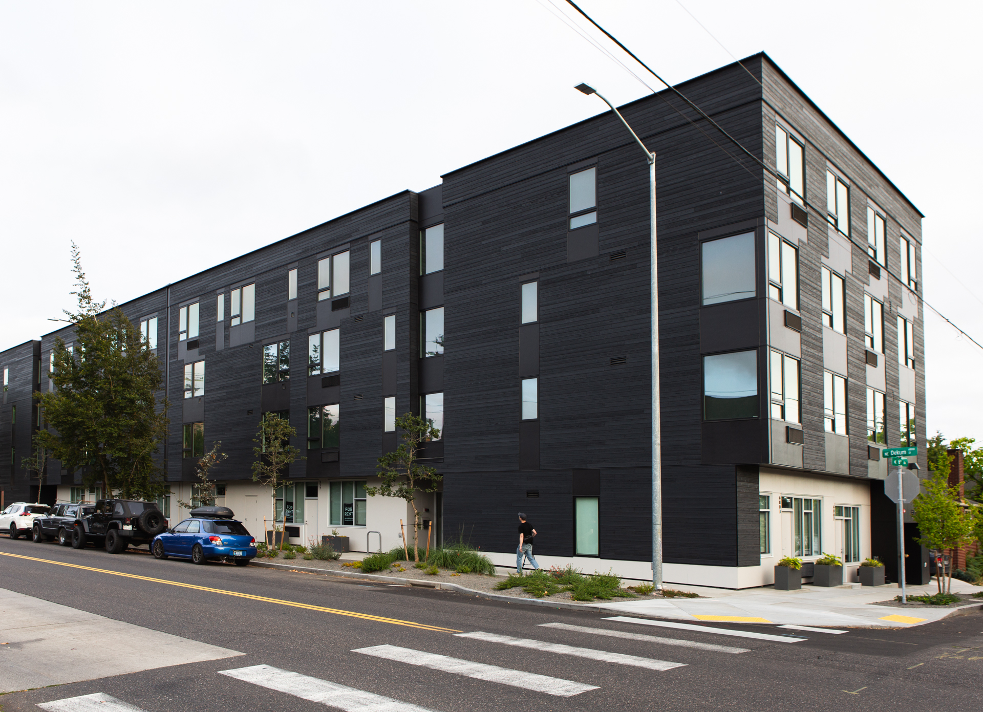 Gendai® Alkyd Dark Gray Yakisugi Siding on the Dekum Apartments