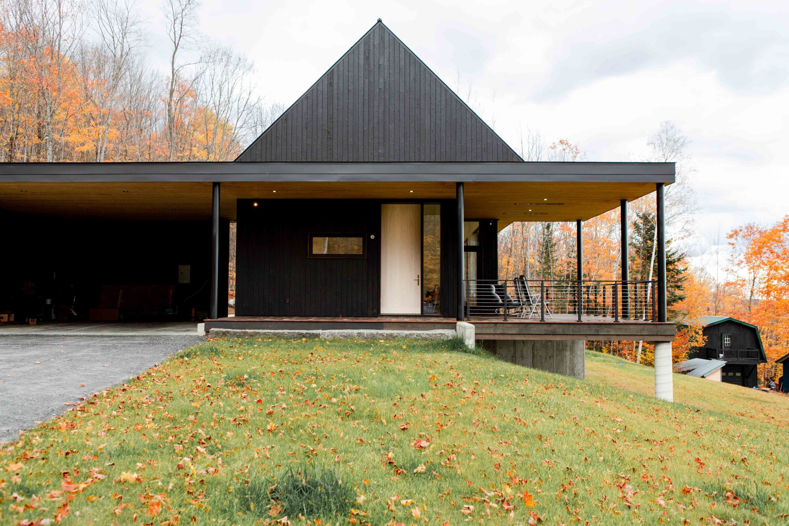 Image of front of Gable and Plane House featuring Nakamoto Forestry's Gendai® Alkyd Black
