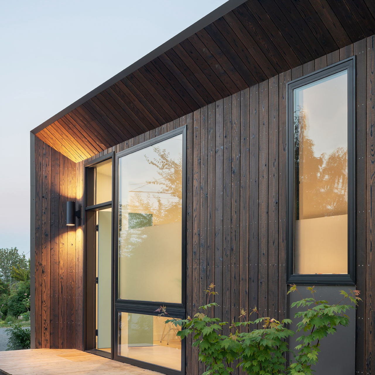 Gendai® Alkyd Natural Yakisugi siding shown on the Solar Studio