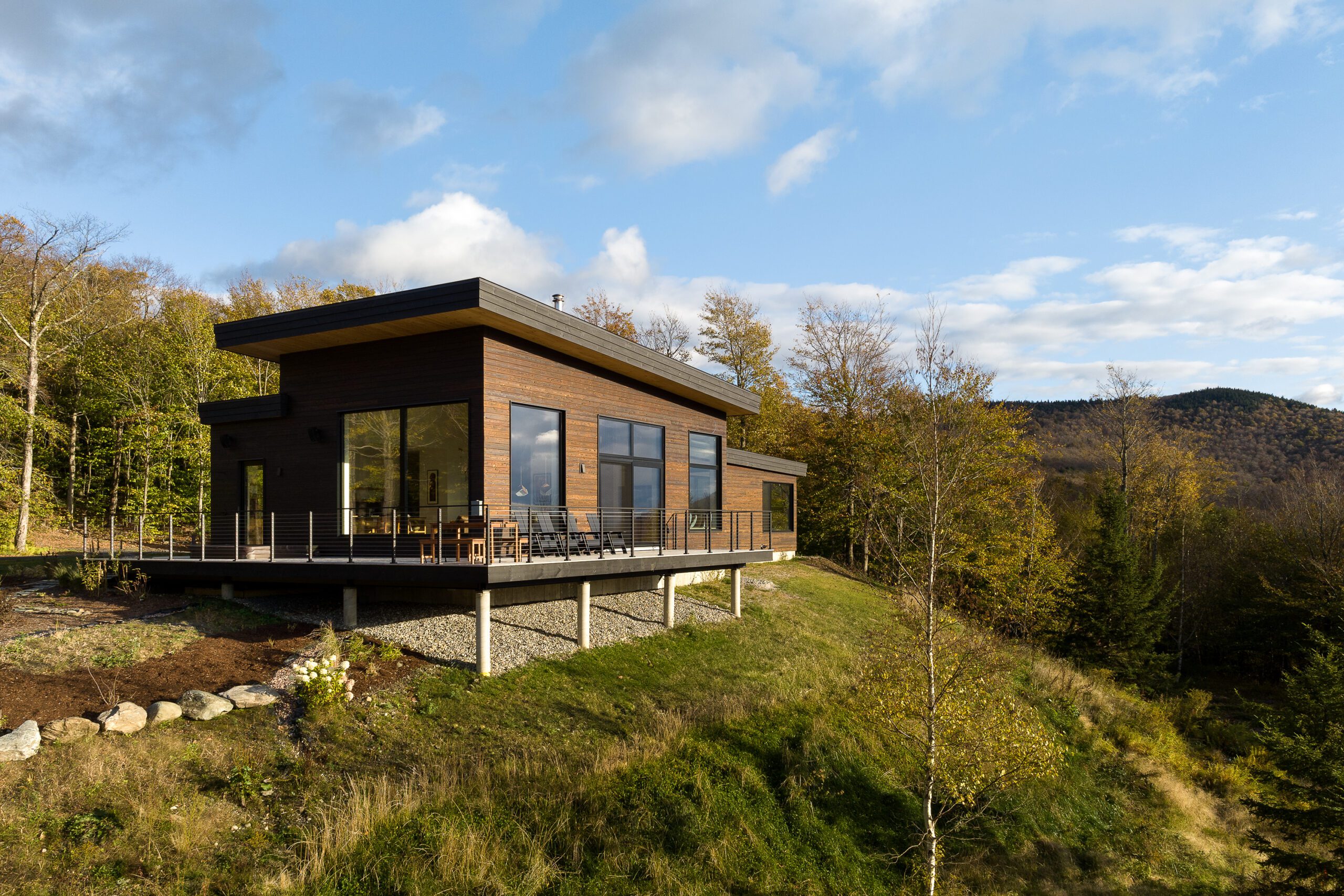 Image of Ridgeline House by Elizabeth Herrmann Architecture + Design, Red House Building. Featuring Nakamoto Forestry's Gendai® Amber Linseed.